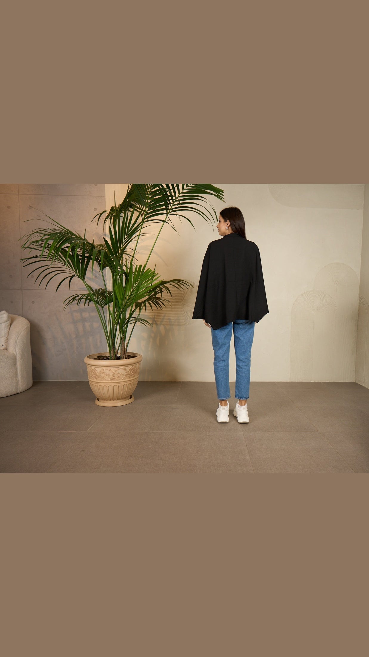 قميص بونشو أسود كبير الحجم للنساء - مريح وأنيق ومتعدد الاستخدامات