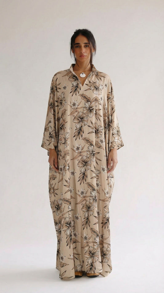 Woman wearing a floral dress on a white background