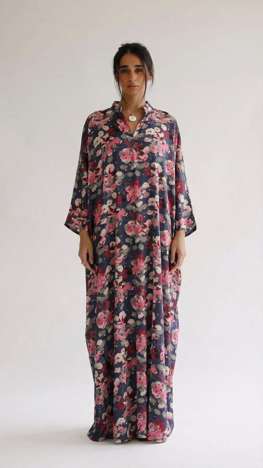 Woman wearing a floral dress on a white background